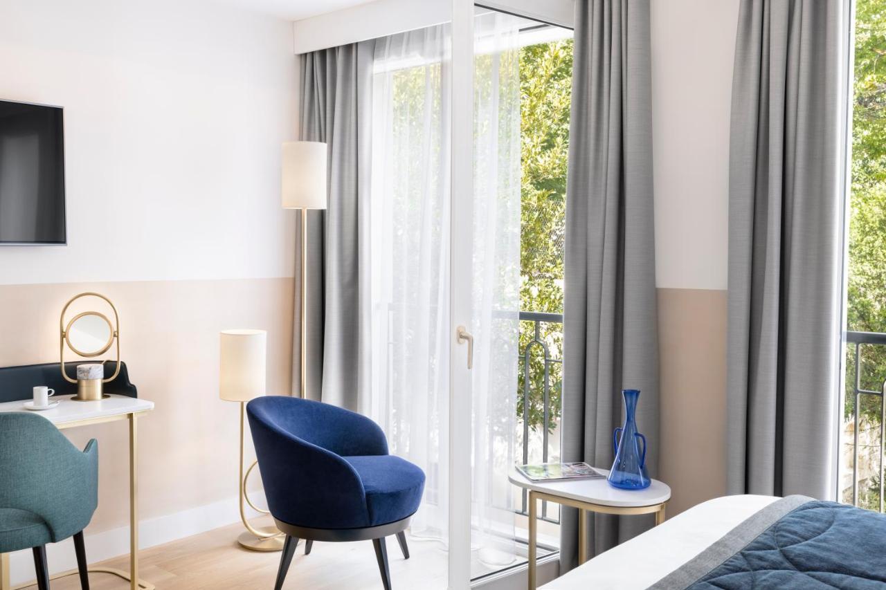 Maison Albar Hotels L'Imperator Nimes Exterior foto A room at the hotel