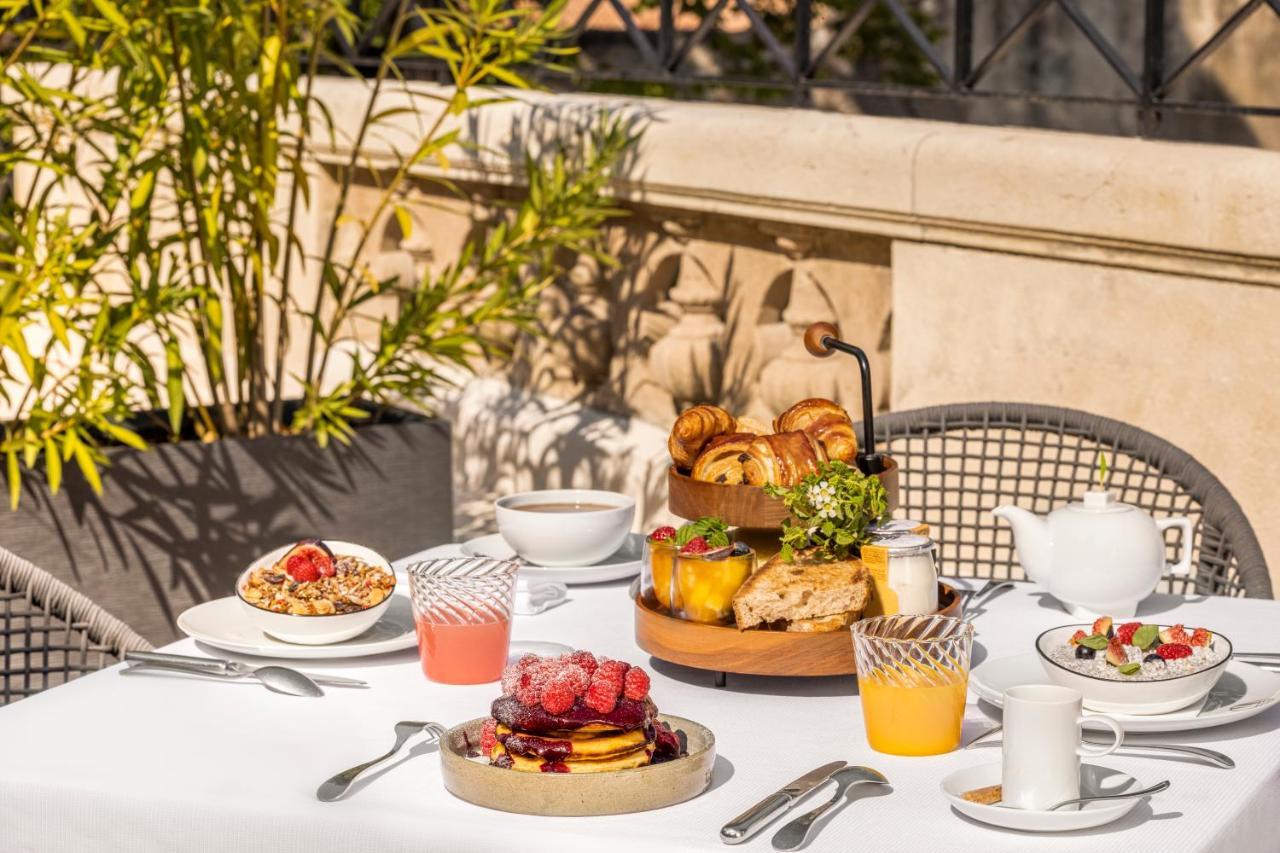 Maison Albar Hotels L'Imperator Nimes Exterior foto Breakfast at the Mandarin Oriental